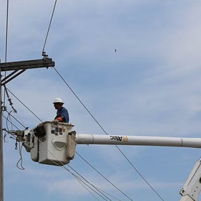 Lineworker in bucket 